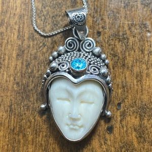 Sterling silver carved moon goddess necklace.